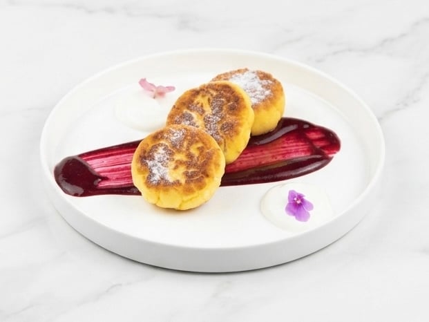 Ricotta sirniki with fresh blueberries